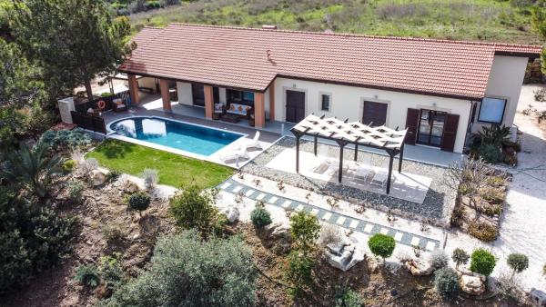 En la foto se muestra el objeto Pine and Olive Seahouse ubicado en la ciudad de Neo Chorio.