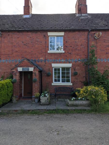 A la foto es mostra l'objecte Shepherds Cottage situat a la ciutat de Nesscliffe.