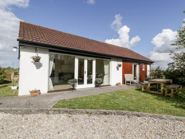 A la foto es mostra l'objecte Wellfield Cottage situat a la ciutat de Highbridge.