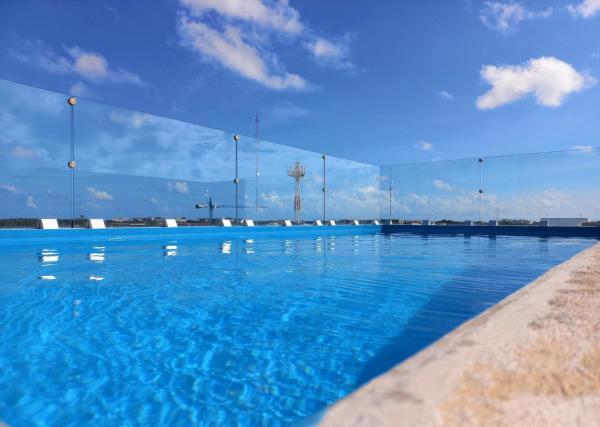 A la foto es mostra l'objecte Cozy and spacious apartment by Tulum 10 situat a la ciutat de Tulum.