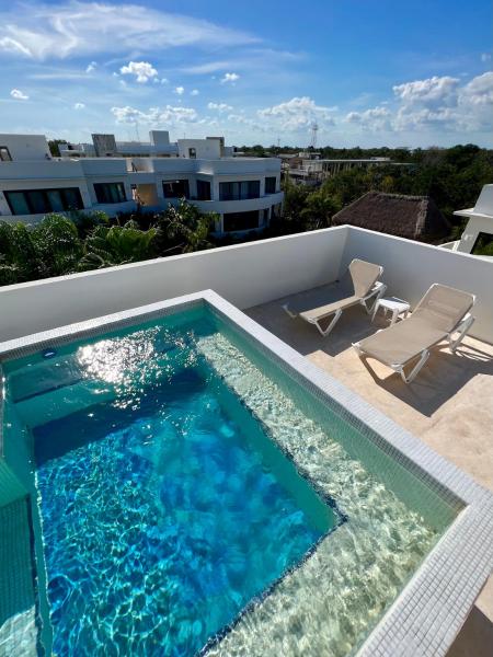 Auf dem Foto ist das Objekt Amazing Luxury Penthouse with sunset,sunrise view, private Jacuzzi and rooftop pool in der Stadt Tulum zu sehen.