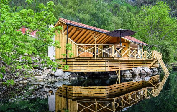 A la foto es mostra l'objecte Lovely Home In Vråliosen With Sauna situat a la ciutat de Moland.