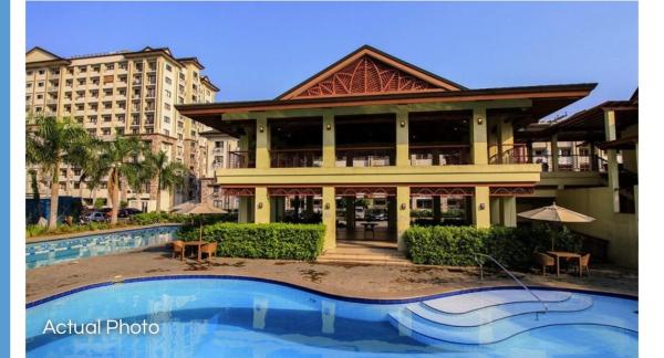 A la foto es mostra l'objecte Lovely 2 BR Condo with FREE Secured Parking situat a la ciutat de Manila.