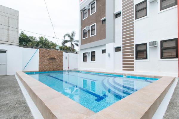 A la foto es mostra l'objecte RedDoorz Plus at DBuilders Poblacion BGC situat a la ciutat de Manila.