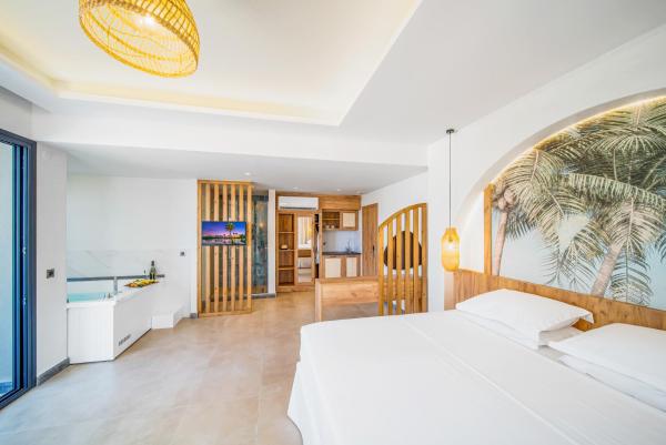 The photo shows the Drossia Residenza Boutique Hotel Malia located in the city of Malia.