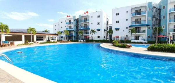 Na fotografii je vidět objekt Caribean Dreams Apartement Beautiful Pool and Gym nacházející se ve městě Limonal Arriba.