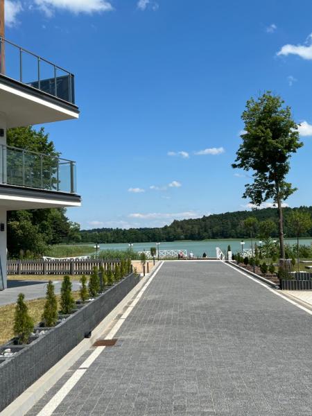 Na foto é possível ver o objeto Apartament nad Jeziorem Juno Mrągowo localizado na cidade de Kiersztanowo.
