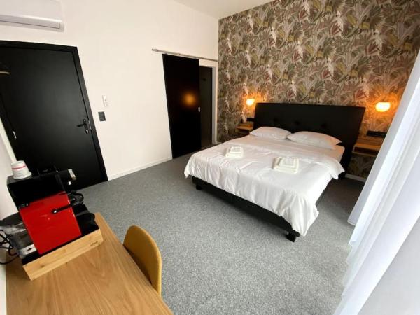 The photo shows the BED Cauchy located in the city of Jambes.