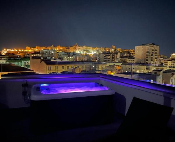På billedet ses objektet 18 Dante Luxury Suites beliggende i byen Cagliari.