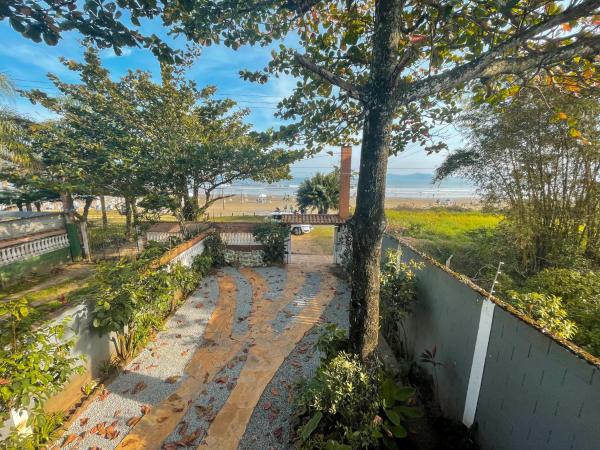 På billedet ses objektet Casa frente ao mar/pé na areia no Indaiá até 18 pessoas beliggende i byen Bertioga.