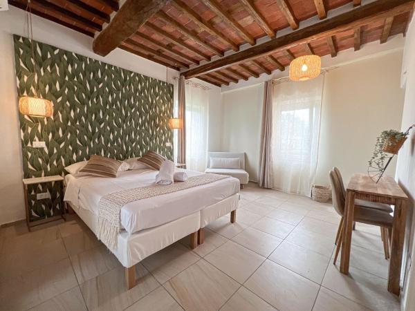 Auf dem Foto ist das Objekt NEW! -Verderame Rooms & Suite in Lucca in der Stadt Lucca zu sehen.