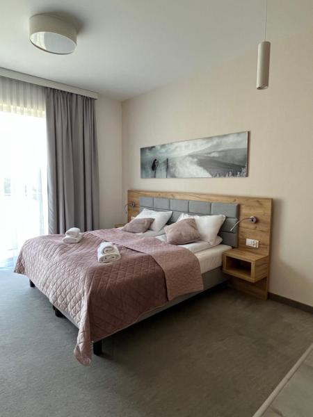 På billedet ses objektet Aparthotel Apartamenty Czarna Góra 112 beliggende i byen Sienna.