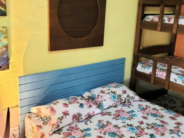 På bilden syns objektet Chalé a 5 minutos da Praia do Perequê som ligger i staden Ilhabela.