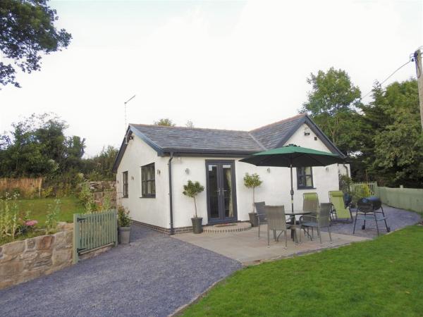 A la foto es mostra l'objecte Cosy country cottage with outdoor bathing situat a la ciutat de Flint.