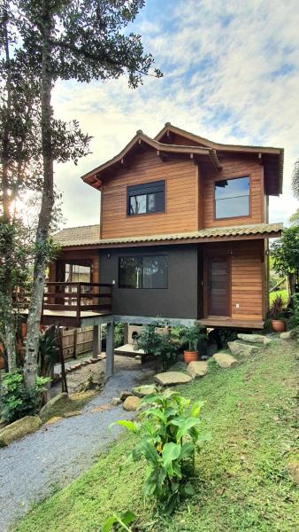 A la foto es mostra l'objecte Charme e conforto - surf pertinho de casa situat a la ciutat de Garopaba.