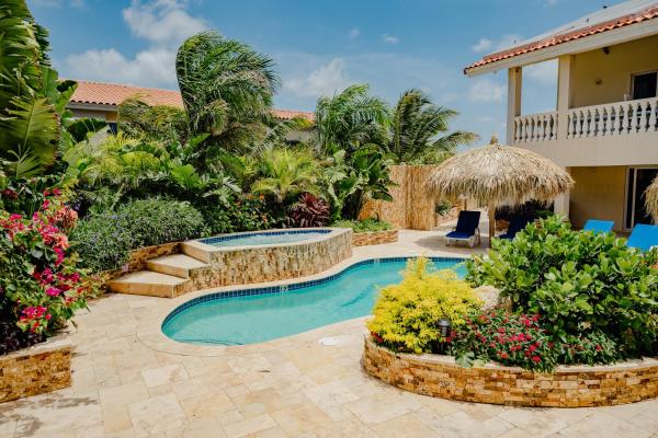 The photo shows the Wonderful 2-bedroom apartment 2 km from Eagle beach located in the city of Cunucu Abao.