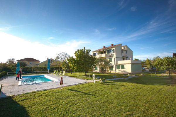 Na fotografii je vidět objekt Family friendly apartments with a swimming pool Nin, Zadar - 6560 nacházející se ve městě Nin.