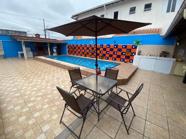 Na fotografii je vidět objekt Casa com Piscina e Churrasqueira nacházející se ve městě Praia Grande.