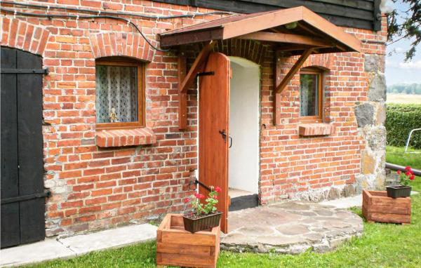 Στη φωτογραφία φαίνεται το αντικείμενο Pet Friendly Apartment In Retowo 4 που βρίσκεται στην πόλη Komnino.