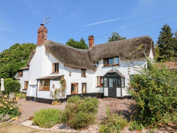 A la foto es mostra l'objecte The Thatched Cottage situat a la ciutat de Crediton.