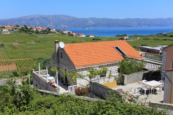 På billedet ses objektet Apartments with parking space Lumbarda, Korcula - 4352 beliggende i byen Lumbarda.