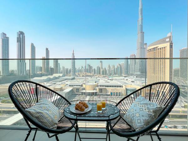 Na fotografii je vidět objekt Stylish 2 Bedroom Dior-Inspired Apartment Connected to Dubai Mall nacházející se ve městě Dubaj.