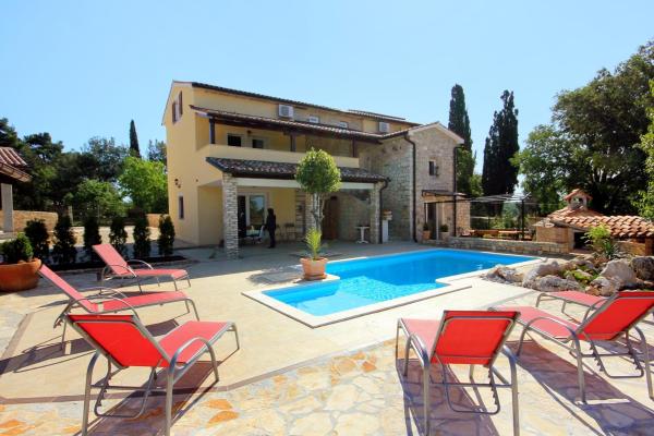 Na zdjęciu widoczny jest obiekt Luxury villa with a swimming pool Manjadvorci, Marcana - 7731 położony w mieście Barban.