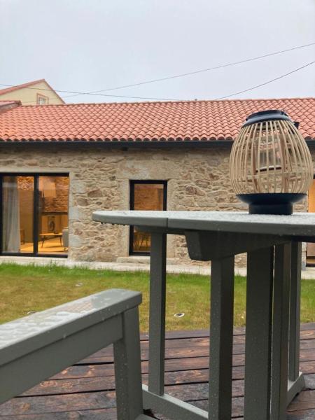 Na fotografii je vidět objekt Casa María da Retratista nacházející se ve městě Quintáns.