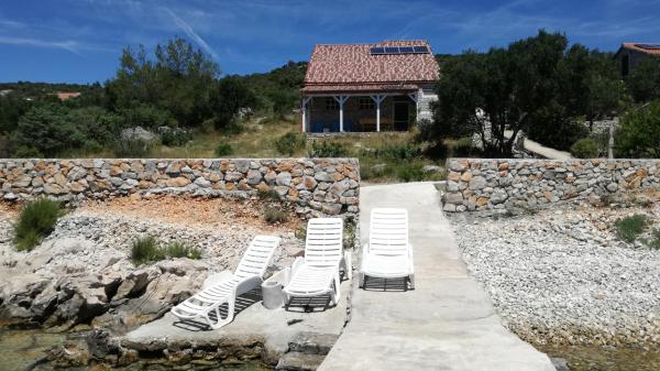 A la foto es mostra l'objecte Seaside house for families with children Cove Vitane, Pasman - 12141 situat a la ciutat de Tkon.
