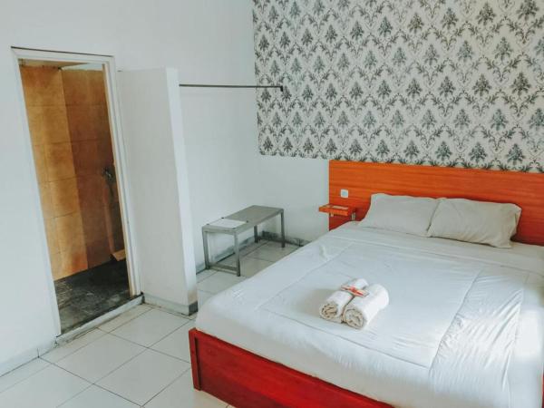 A la foto es mostra l'objecte De Luck Homestay near Alun Alun Sidoarjo situat a la ciutat de Buduran.