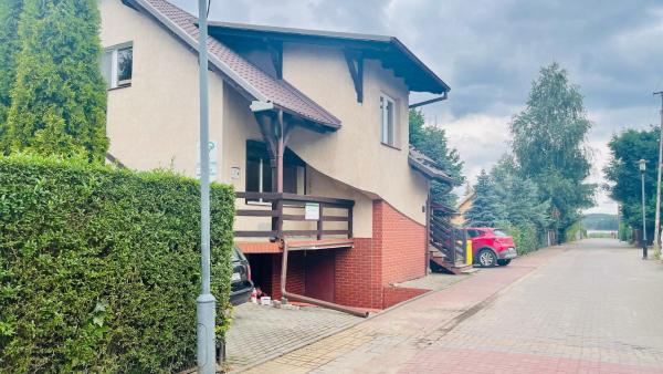 Na fotografii je vidět objekt Apartament Kormoranów 3 nacházející se ve městě Charzykowy.