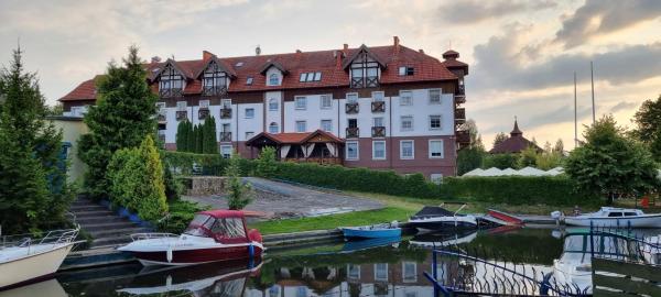 På billedet ses objektet Apartamenty Przy Porcie 54m2 oraz 31m2 z Tarasem beliggende i byen Węgorzewo.