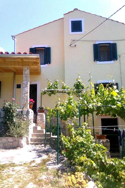 The photo shows the Seaside holiday house Miholascica, Cres - 8073 located in the city of Vrana.