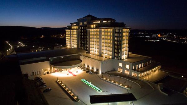 The photo shows the ALUSSO THERMAL HOTEL SPA located in the city of Afyon.