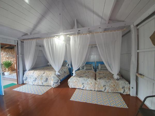 The photo shows the Scuba Republic Beach Bungalows located in the city of Lemo Lemo.