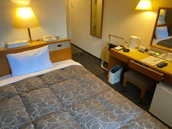 The photo shows the Az Inn Fukui (Ace Inn Fukui) located in the city of Omachi.