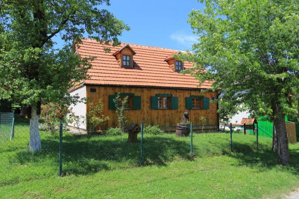 The photo shows the Apartments for families with children Perusic (Velebit) - 17540 located in the city of Bukovac.