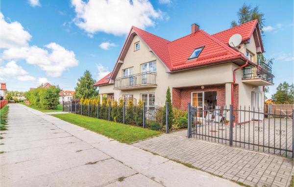 På bilden syns objektet Cozy Apartment In Rowy With Kitchen som ligger i staden Rowy.
