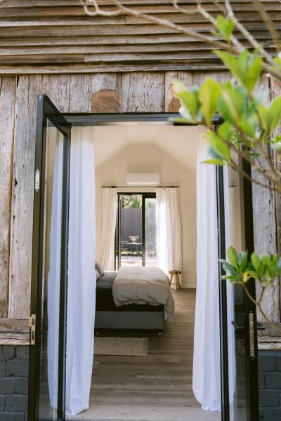 The photo shows the Redwood Park - Luxury Off Grid Accommodation located in the city of Wollombi.