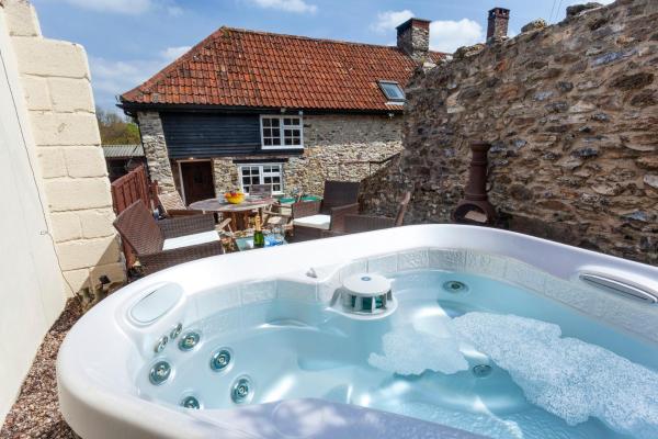 A la foto es mostra l'objecte Southcott Farm Cottage situat a la ciutat de Broadhembury.
