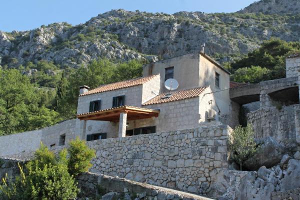 На фото показан объект Family friendly house with a swimming pool Mihanici, Dubrovnik - 9029, расположенный в городе Nartiće.