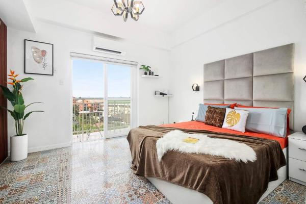 A la foto es mostra l'objecte Hyllia by J&J Homes At Amani Grand Resort Residences Near Airport situat a la ciutat de Pusok.