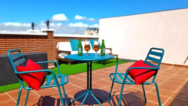 Na zdjęciu widoczny jest obiekt Ático Deluxe Granada, Parking gratis y Terraza położony w mieście Armilla.