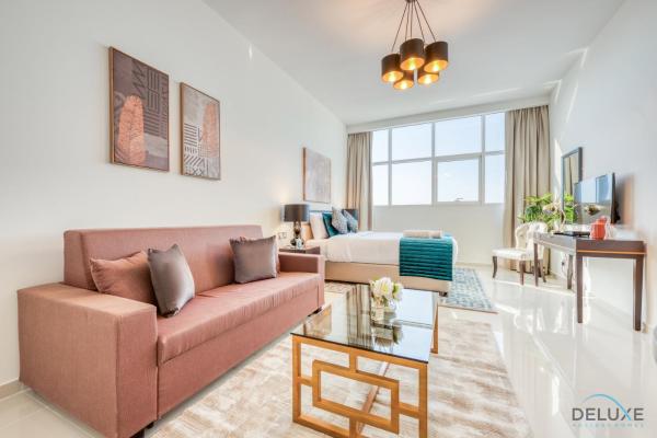 Na fotografii je vidět objekt Intimate Studio in Damac Ghalia Jumeirah Village Circle by Deluxe Holiday Homes nacházející se ve městě Dubaj.