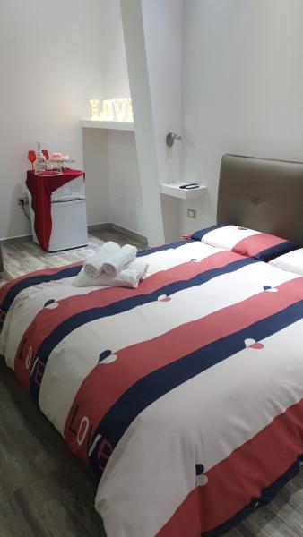 Na zdjęciu widoczny jest obiekt Le Volte Apartments położony w mieście Torchiarolo.