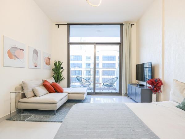 Na fotografii je vidět objekt Elite LUX Holiday Homes - Modern Studio in Arjan, Dubai nacházející se ve městě Dubaj.