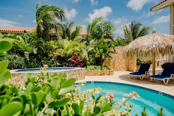 The photo shows the Best quality 2-bedroom apartment 2 km from Eagle beach located in the city of Cunucu Abao.