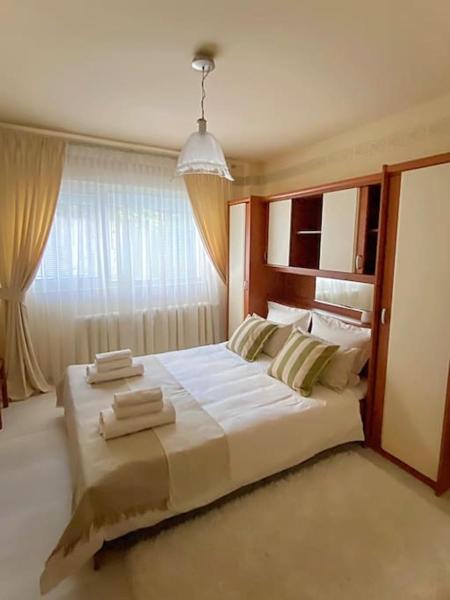 A la foto es mostra l'objecte Lovely & quiet 1-bedroom condo with free parking situat a la ciutat de Bucarest.