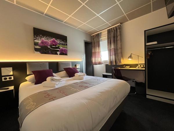 Na fotografii je vidět objekt BRIT HOTEL LE VESOUL nacházející se ve městě Bougnon.