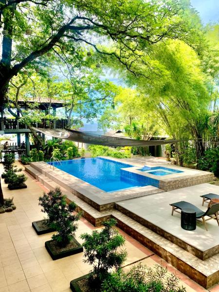 Na fotografii je vidět objekt The Henry Resort Taramindu Laiya nacházející se ve městě Soloc.